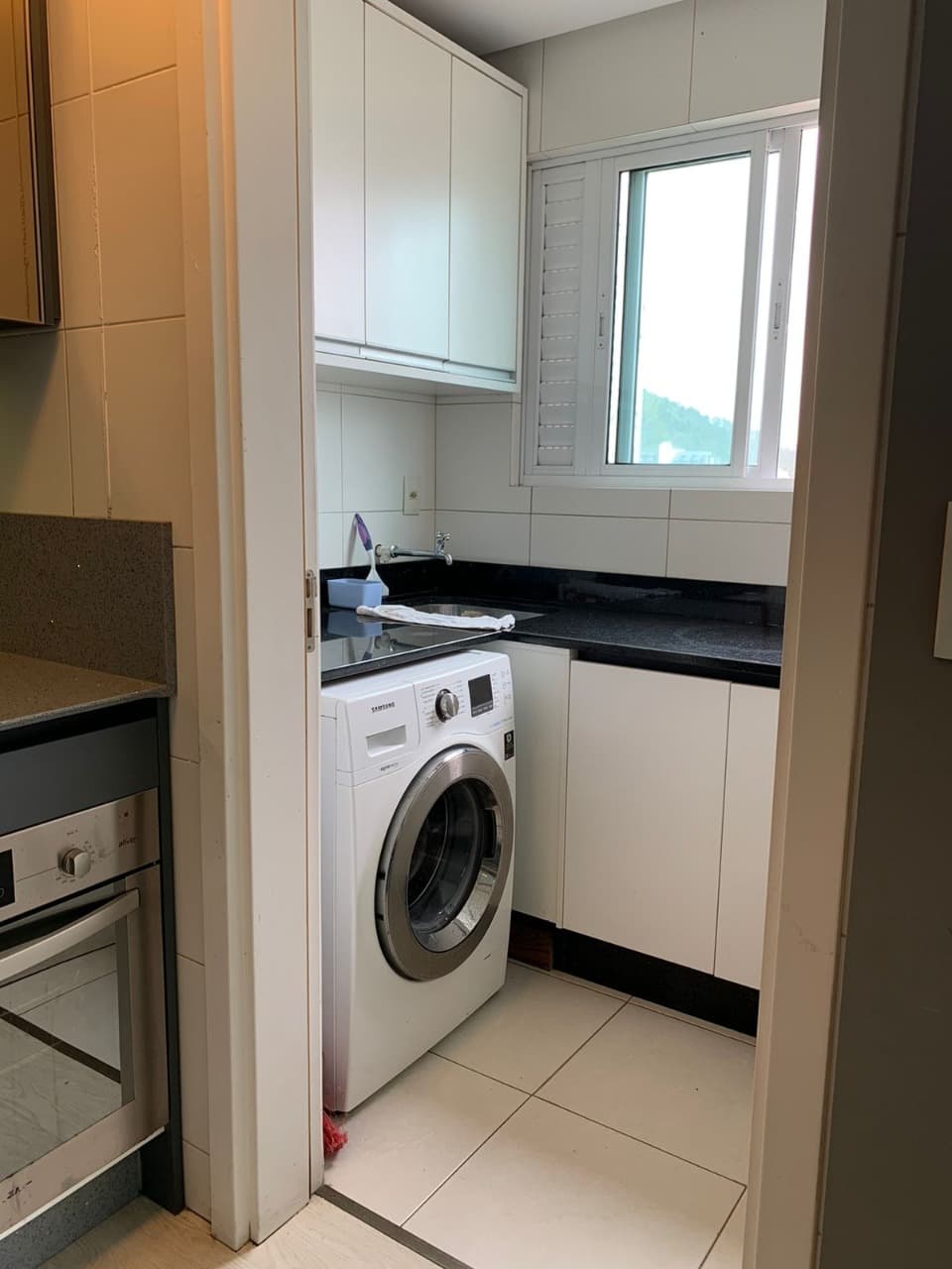 Apartamento para Locação com 2 quartos sendo 1 suíte, 2 vagas no bairro Centro em Itajaí/SC: 07 - ÁREA DE SERVIÇO